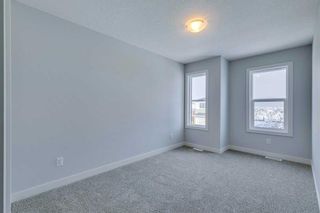 Photo 10: 71 Belvedere Green SE in Calgary: Belvedere Detached for sale : MLS®# A2100390