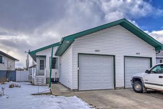 Photo 1: 1411 Strathcona Way: Strathmore Semi Detached (Half Duplex) for sale : MLS®# A2098626