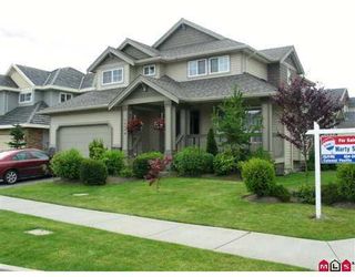 Photo 1: 16654 63A Avenue in Surrey: Cloverdale BC House for sale in "Clover Ridge" (Cloverdale)  : MLS®# F2717287