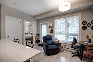 Photo 4: 112 383 Smith Street NW in Calgary: University District Apartment for sale : MLS®# A2051453