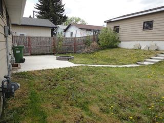 Photo 9: 438 Queensland Place SE in Calgary: Queensland Detached for sale : MLS®# A1222170