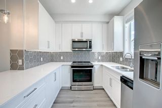Photo 12: 608 16 Evanscrest Park NW in Calgary: Evanston Row/Townhouse for sale : MLS®# A1259126