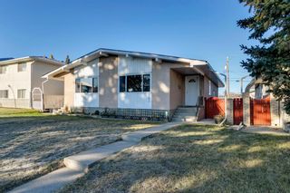 Photo 2: A & B 927 43 Street SW in Calgary: Rosscarrock Duplex for sale : MLS®# A1150334