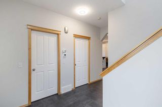 Photo 5: 28 Cougar Ridge Link SW in Calgary: Cougar Ridge Detached for sale : MLS®# A2079092