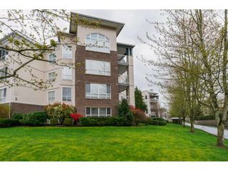 Photo 2: 308 20200 54A AVENUE in Langley: Langley City Condo for sale : MLS®# R2221595