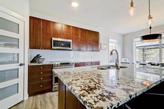 Photo 7: 63 Aspen Stone Terrace SW in Calgary: Aspen Woods Detached for sale : MLS®# A2052596