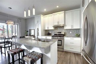 Photo 2: 1023 BRIGHTONCREST Green SE in Calgary: New Brighton Detached for sale : MLS®# A1014253
