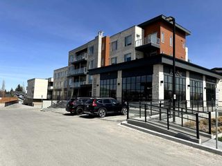 Photo 2: 104 30 Shawnee Common SW in Calgary: Shawnee Slopes Apartment for sale : MLS®# A2125585