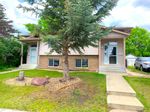 Main Photo: 5412 39 Street: Red Deer Semi Detached (Half Duplex) for sale : MLS®# A1229444