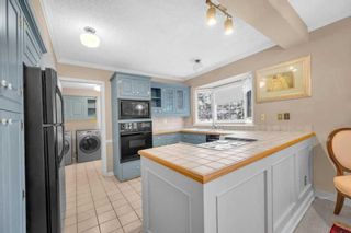 Photo 15: 755 Acadia Drive SE in Calgary: Willow Park Detached for sale : MLS®# A2094472