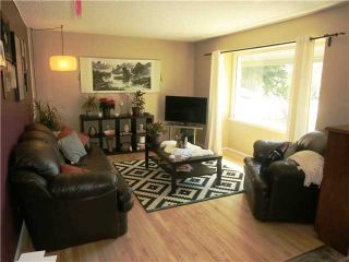 Photo 2: 1046 REGAL Crescent NE in CALGARY: Renfrew_Regal Terrace Residential Detached Single Family for sale (Calgary)  : MLS®# C3614231