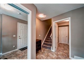 Photo 4: 113 WINDSTONE Mews SW: Airdrie House for sale : MLS®# C4016126