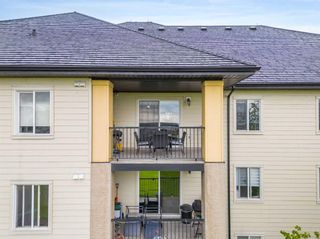 Photo 2: 7412 304 Mackenzie Way SW: Airdrie Apartment for sale : MLS®# A2134542