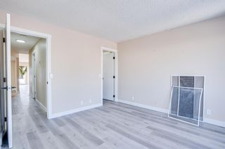 Photo 12: 84 Rivervalley Drive SE in Calgary: Riverbend Detached for sale : MLS®# A2034908