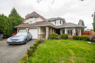 Photo 1: 14215 86B Avenue in Surrey: Bear Creek Green Timbers House for sale : MLS®# R2562720
