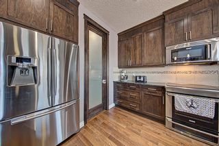 Photo 4: 437 Kinniburgh Boulevard: Chestermere Detached for sale : MLS®# A2021132