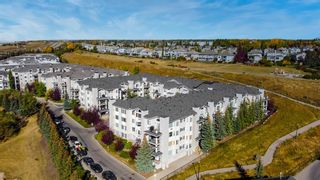 Photo 1: 107 345 Rocky Vista Park NW in Calgary: Rocky Ridge Apartment for sale : MLS®# A2009076