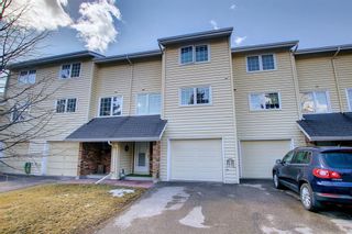 Photo 1: 376 Point Mckay Gardens NW in Calgary: Point McKay Row/Townhouse for sale : MLS®# A1200702