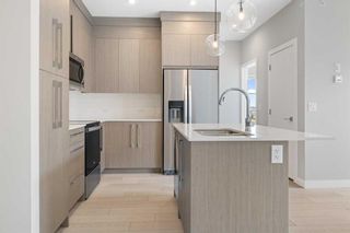 Photo 2: 1406 681 Savanna Boulevard NE in Calgary: Saddle Ridge Apartment for sale : MLS®# A2129782