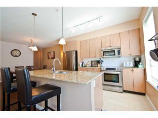 Photo 2: 203 290 FRANCIS Way in New Westminster: Fraserview NW Condo for sale in "The Grove" : MLS®# V837552