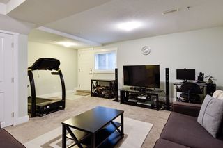 Photo 25: 21038 77A Avenue in Langley: Willoughby Heights Condo for sale in "IVY ROW" : MLS®# R2474522