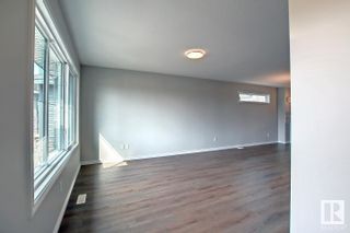 Photo 3: 5720 JUCHLI Avenue in Edmonton: Zone 27 Attached Home for sale : MLS®# E4310447