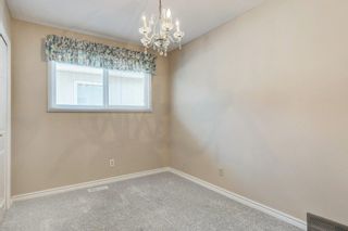 Photo 15: 148 Queen Anne Way SE in Calgary: Queensland Detached for sale : MLS®# A2040152
