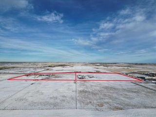 Photo 1: 283135 GLENMORE Trail in Rural Rocky View County: Rural Rocky View MD Commercial Land for sale : MLS®# A2131575