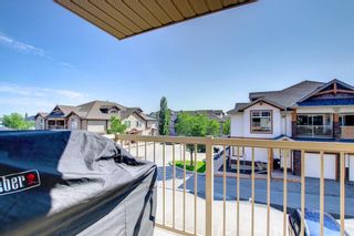 Photo 6: 205 70 Panatella Landing NW in Calgary: Panorama Hills Row/Townhouse for sale : MLS®# A1223952