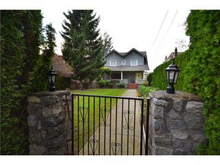 Photo 1: 5897 MACDONALD Street in Vancouver: Kerrisdale House for sale in "KERRISDALE" (Vancouver West)  : MLS®# V931581