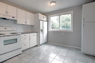 Photo 12: 12 5625 Silverdale Drive NW in Calgary: Silver Springs Row/Townhouse for sale : MLS®# A1240629