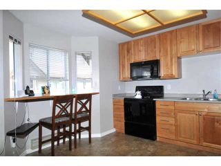 Photo 3: 19 2352 PITT RIVER Road in Port Coquitlam: Mary Hill Townhouse for sale in "SHAUGHNESSY ESTATES" : MLS®# V945682