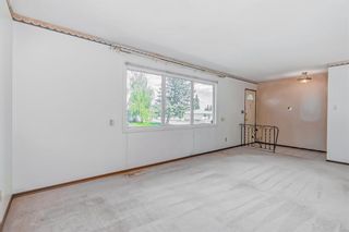 Photo 6: 911 104 Avenue SW in Calgary: Southwood Detached for sale : MLS®# A2054018