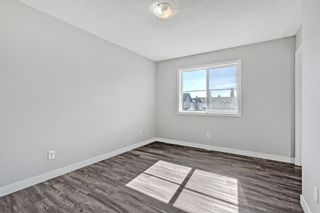Photo 17: 136 Everridge Gardens SW in Calgary: Evergreen Row/Townhouse for sale : MLS®# A1259244