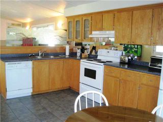 Photo 2: 92 145 KING EDWARD Street in Coquitlam: Coquitlam East Manufactured Home for sale in "MILLCREEK VILLAGE" : MLS®# V969164