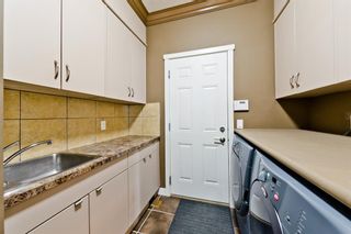 Photo 11: 125 COUGARSTONE Manor SW in Calgary: Cougar Ridge Detached for sale : MLS®# A1019561