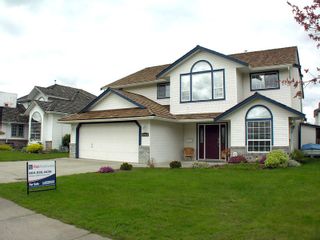 Photo 2: 35453 LETHBRIDGE Drive in Abbotsford: Abbotsford East House for sale in "Sandy Hill" : MLS®# F1110467