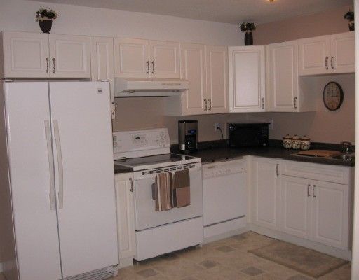 Photo 10: Photos: 4410 E 52ND Avenue in Fort_Nelson: Fort Nelson -Town House for sale in "MIDTOWN" (Fort Nelson (Zone 64))  : MLS®# N188683