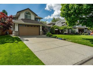 Photo 1: 6443 188A Street in Surrey: Cloverdale BC House for sale in "CHARTWELL" (Cloverdale)  : MLS®# R2456471