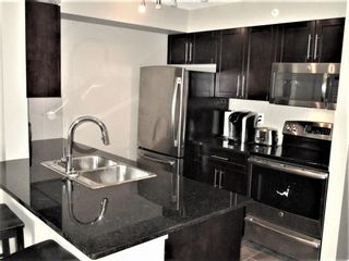Photo 4: 8407 403 Mackenzie Way SW: Airdrie Apartment for sale : MLS®# A1120611
