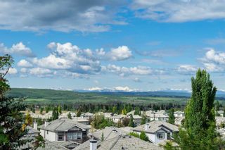 Photo 2: 7771 Springbank Way SW in Calgary: Springbank Hill Detached for sale : MLS®# A2058722