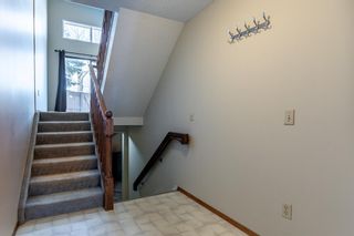 Photo 4: 28 Glamis Gardens SW in Calgary: Glamorgan Row/Townhouse for sale : MLS®# A1205535