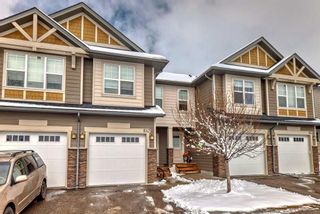 Photo 2: 647 101 Sunset Drive: Cochrane Row/Townhouse for sale : MLS®# A2119340