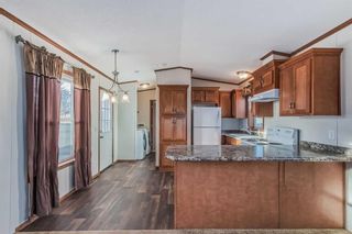 Photo 10: 105 9090 24 Street SE in Calgary: Riverbend Mobile for sale : MLS®# A2098503
