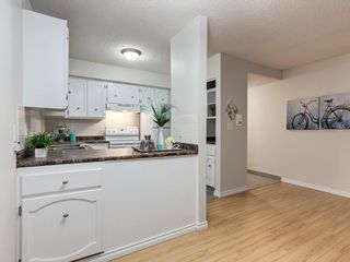 Photo 2: 102 1001 68 Avenue SW in Calgary: Kelvin Grove Apartment for sale : MLS®# C4221985