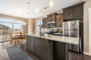 Photo 1: 642 Redstone View NE in Calgary: Redstone Row/Townhouse for sale : MLS®# A2116958