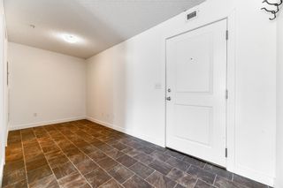 Photo 2: 4117 403 Mackenzie Way: Airdrie Apartment for sale : MLS®# A2044327
