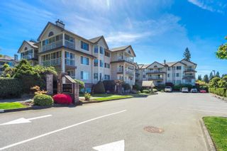 Photo 1: 206 2491 GLADWIN Road in Abbotsford: Abbotsford West Condo for sale in "LAKEWOOD GARDENS" : MLS®# R2777309