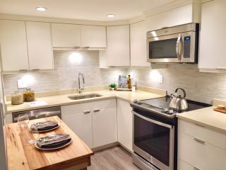 Photo 1: 107 215 N TEMPLETON Drive in Vancouver: Hastings Condo for sale in "PORTO VISTA" (Vancouver East)  : MLS®# R2120278
