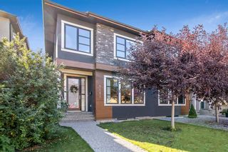 Photo 1: 1121 21 Avenue NW in Calgary: Capitol Hill Semi Detached (Half Duplex) for sale : MLS®# A2004202